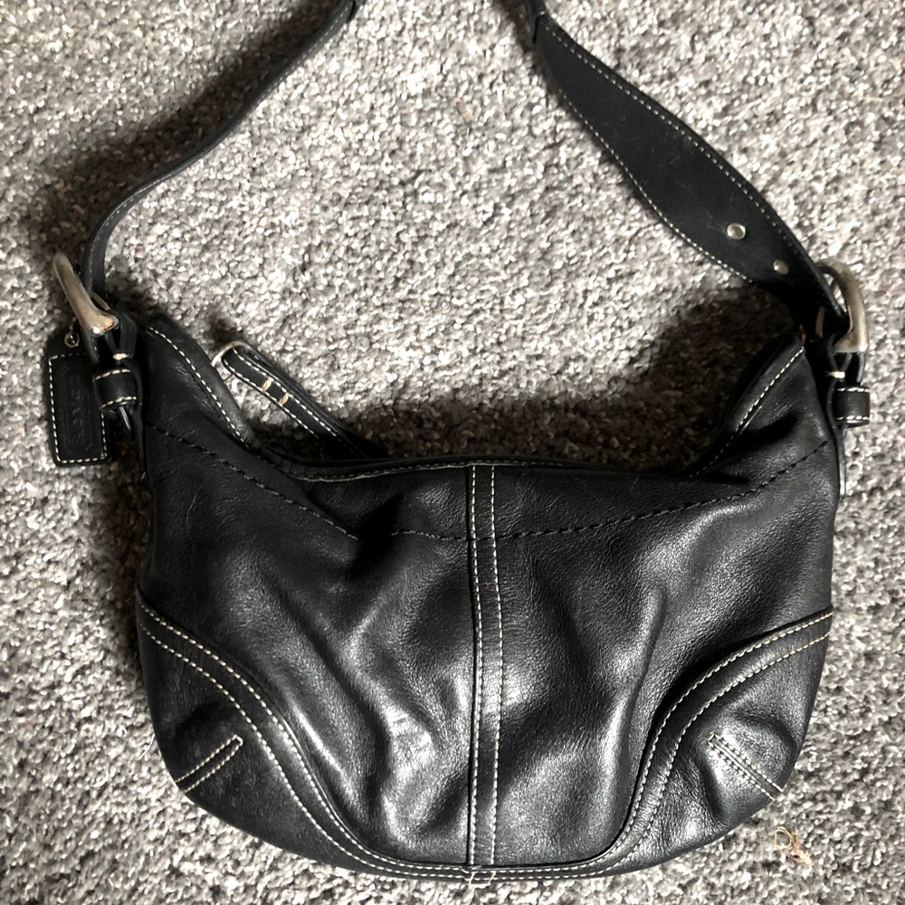 Black small authentic Coach purse with duster